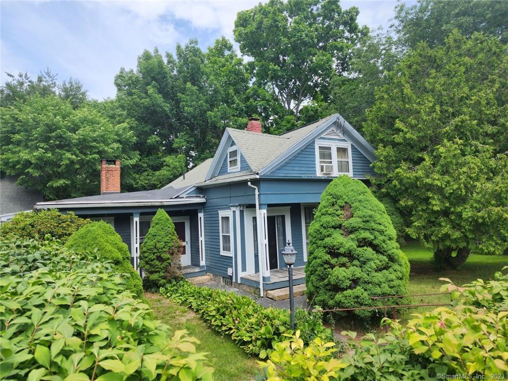 137 Soap Street Killingly, CT 06241 - Photo 1 of 1 a front view of a house with garden