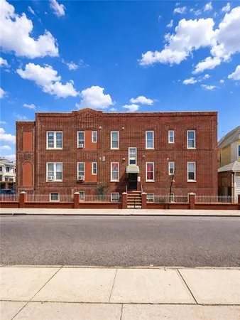 a view of a building and a street