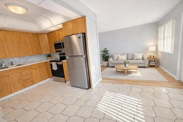a view of wooden floor and chair in a room