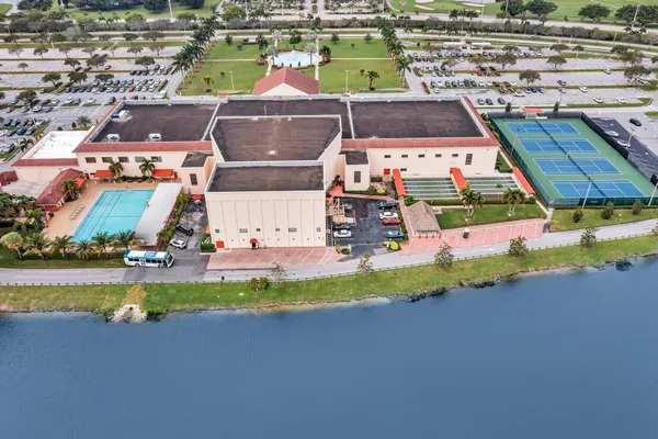 a kitchen with stainless steel appliances granite countertop a refrigerator sink and microwave