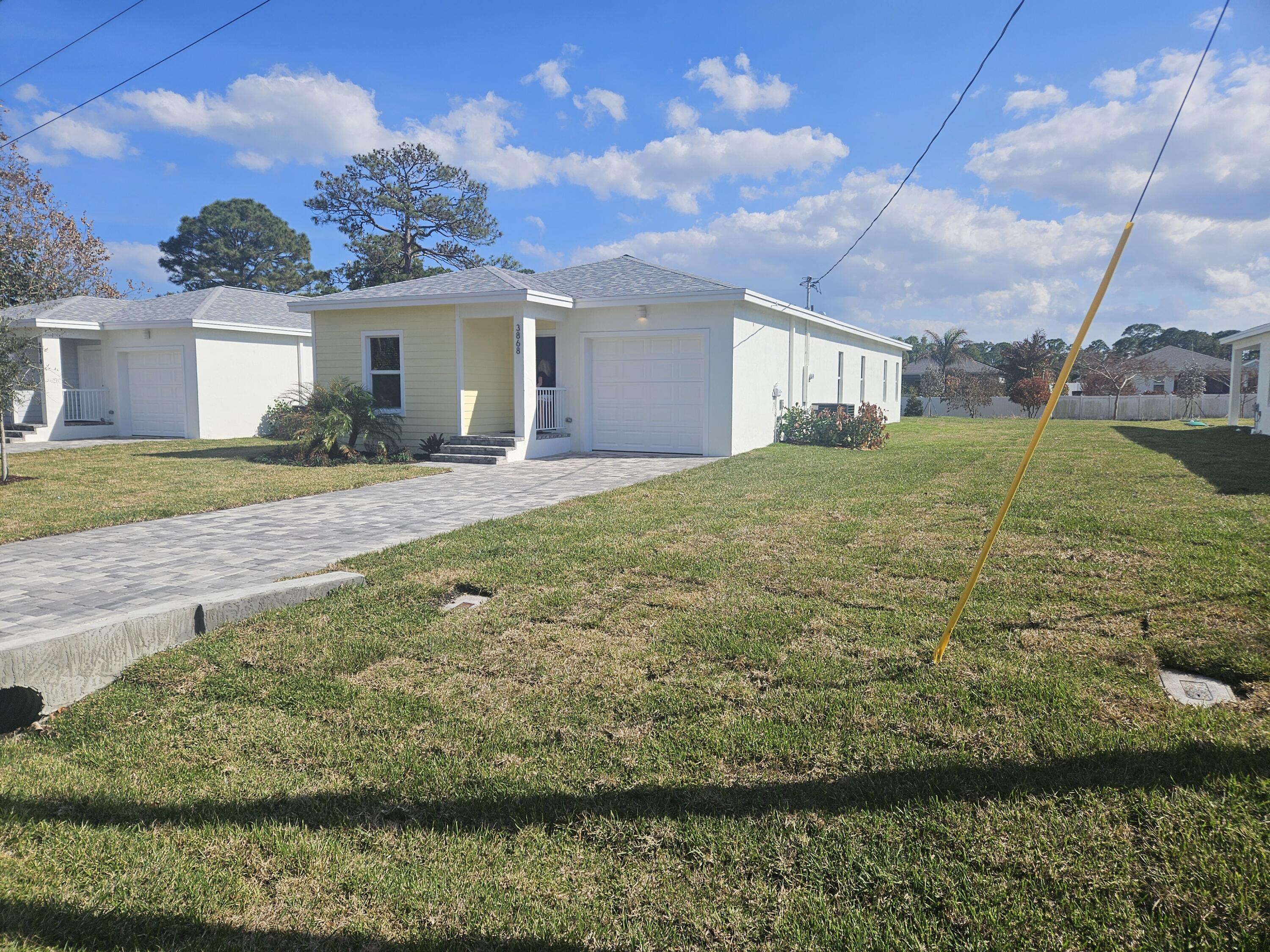 3868 Southeast Grant Street Stuart, FL 34997 - Photo 2 of 40 20260219_144324