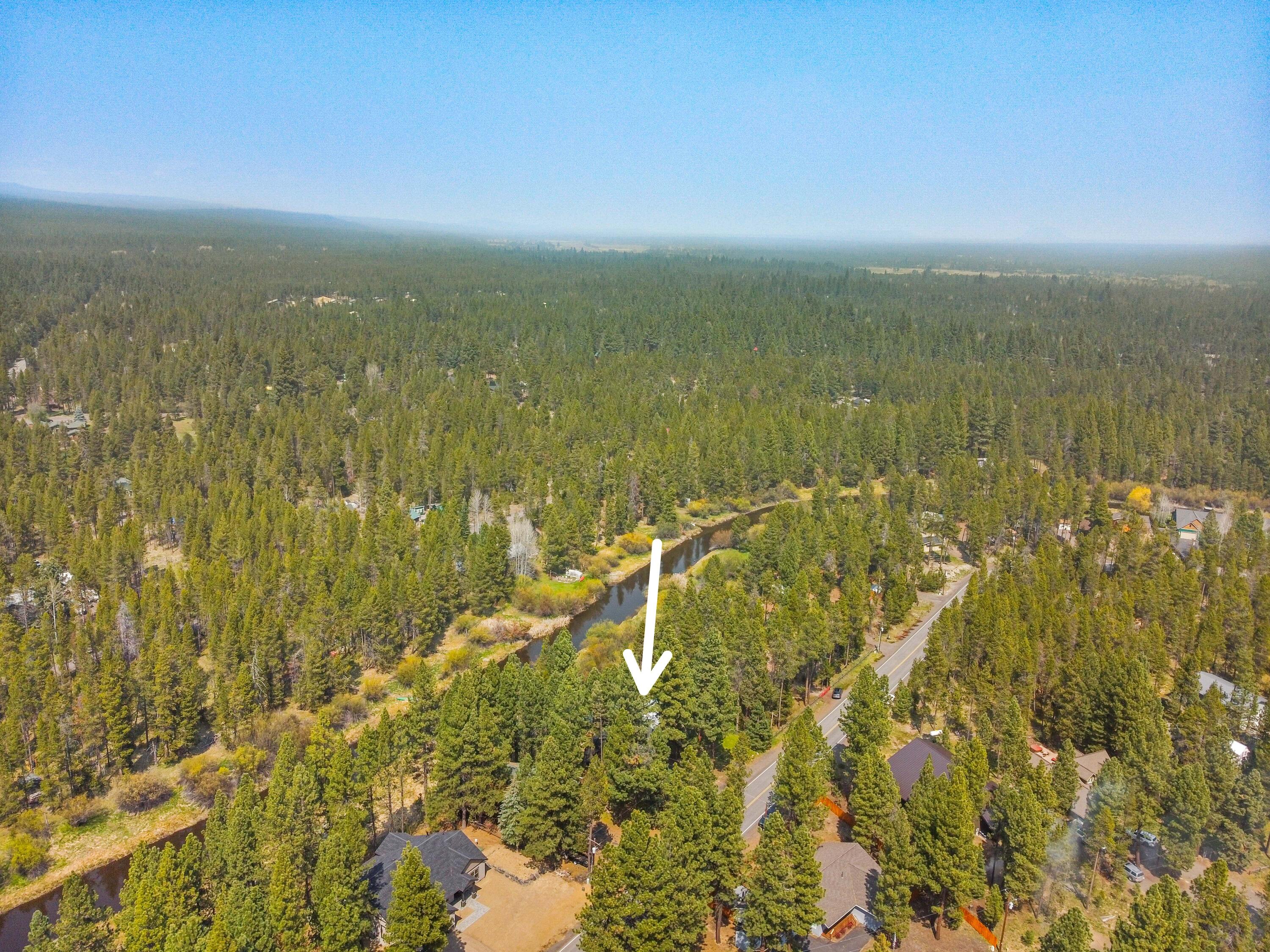 17062 Milky Way Bend, OR 97707 - Photo 3 of 39 Sweeping aerial of the chalet's setting within the iconic Central Oregon pine forest