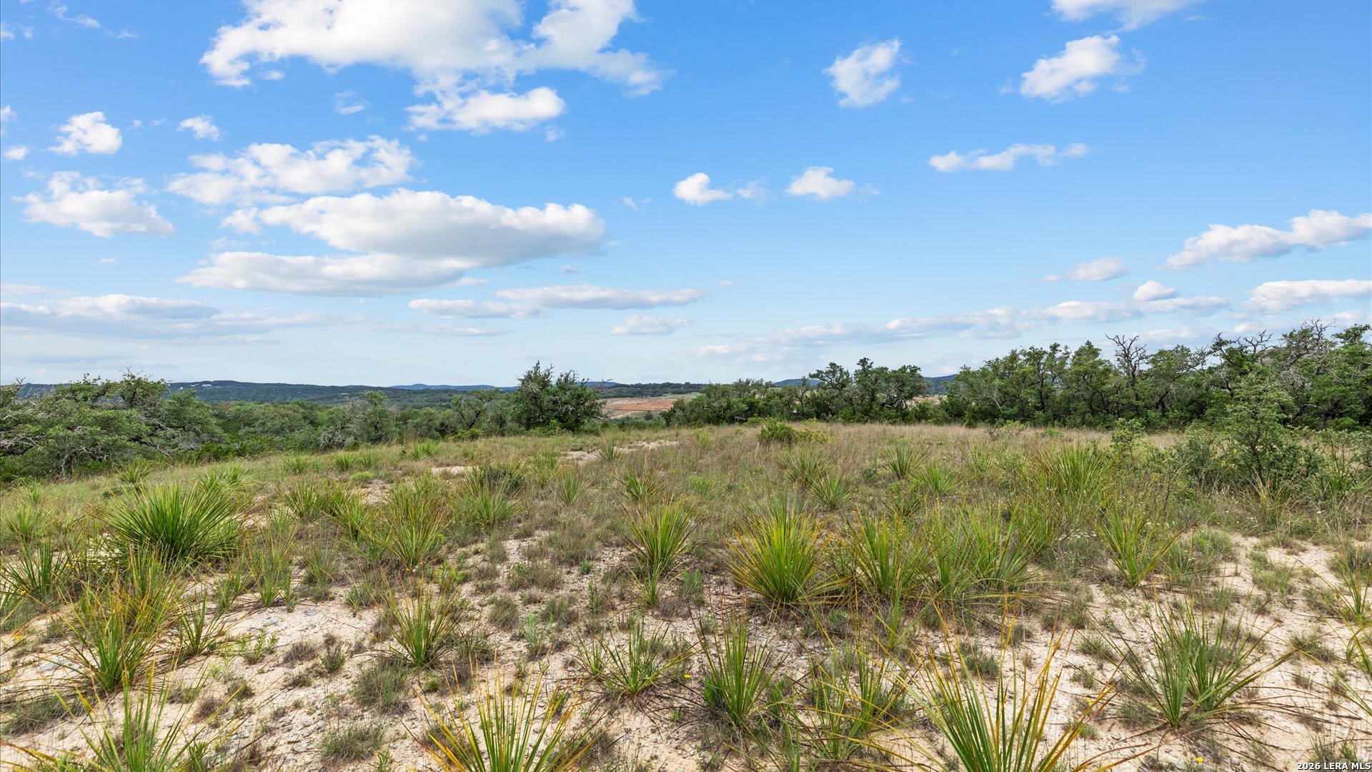22073 Scenic Loop Road Helotes, TX 78023 - Photo 13 of 27 a view of lake with green space