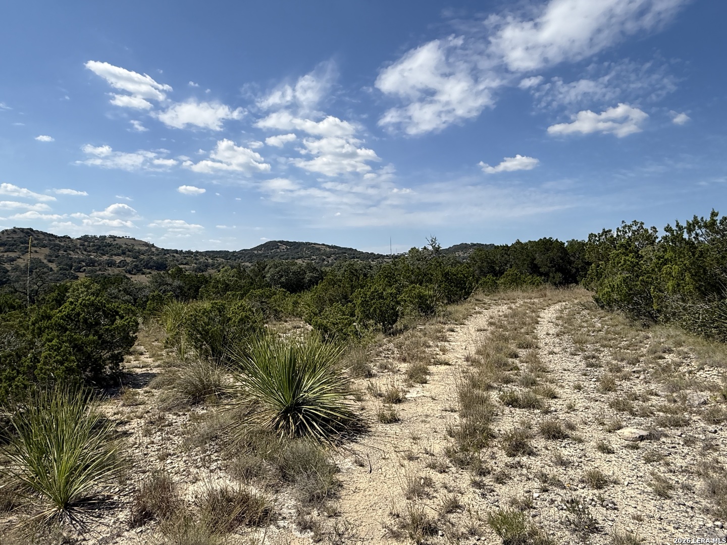 22073 Scenic Loop Road Helotes, TX 78023 - Photo 17 of 27 a view of lake with green space