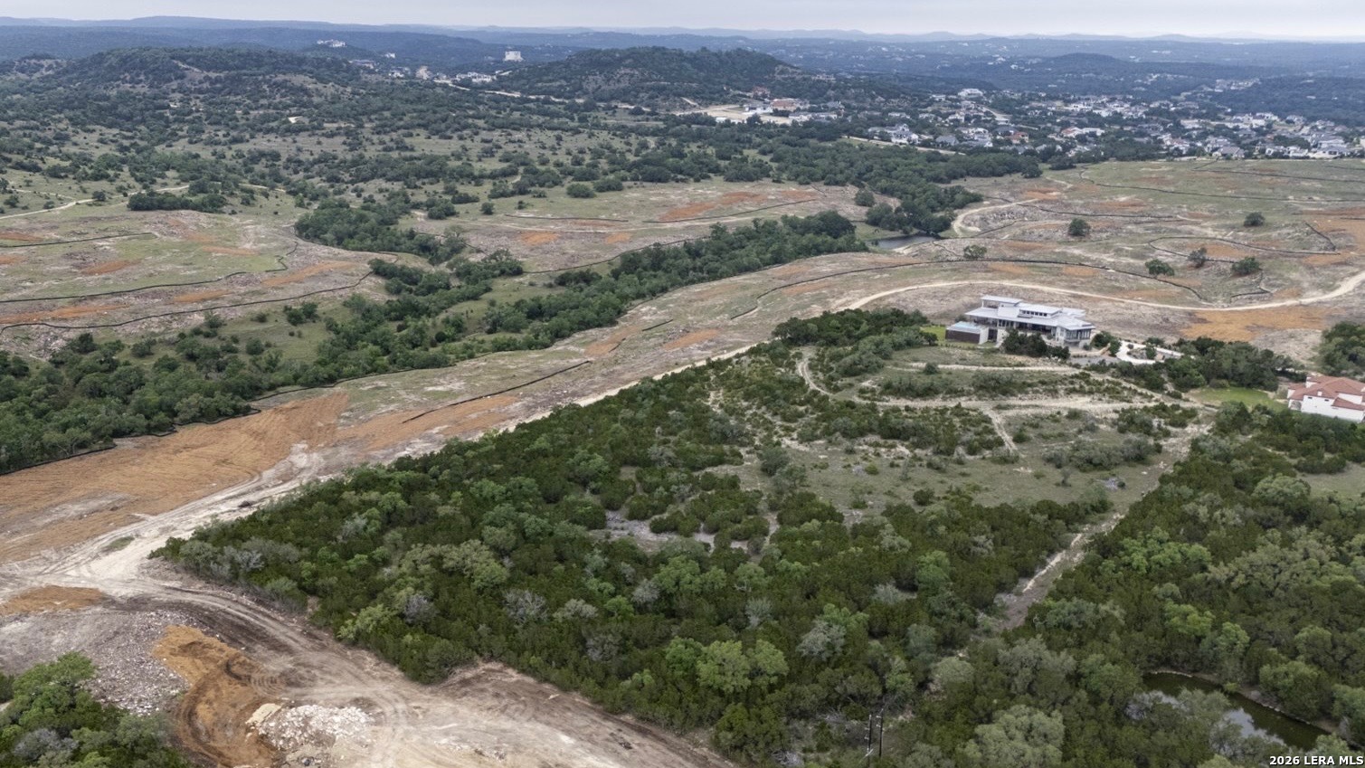 22073 Scenic Loop Road Helotes, TX 78023 - Photo 18 of 27 an aerial view of mountains and trees