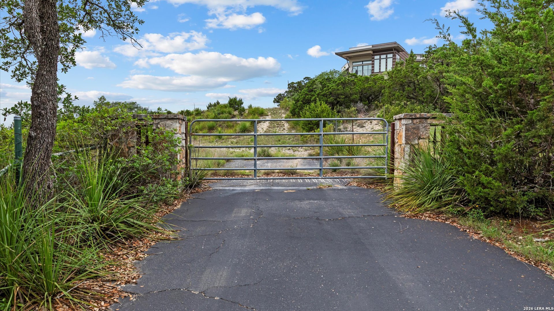 22073 Scenic Loop Road Helotes, TX 78023 - Photo 25 of 27 a view of a backyard