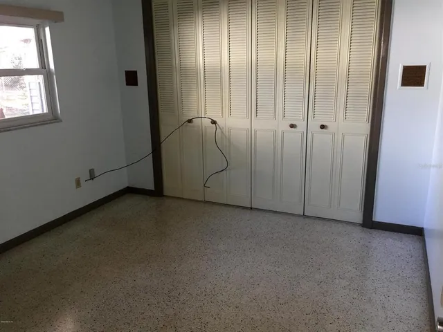a bathroom with a toilet and a bathtub