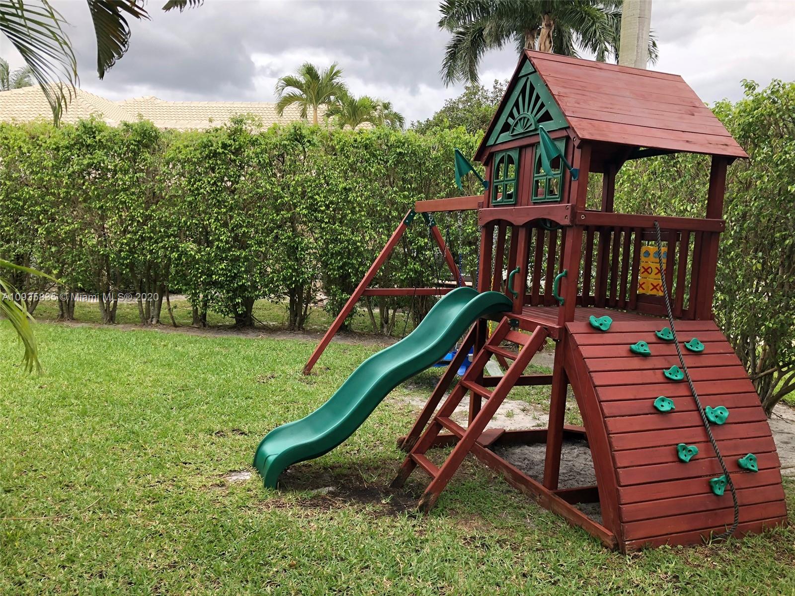 Boca Isles Boca Raton, FL 33498 - Photo 17 of 17 a view of a chairs in a backyard