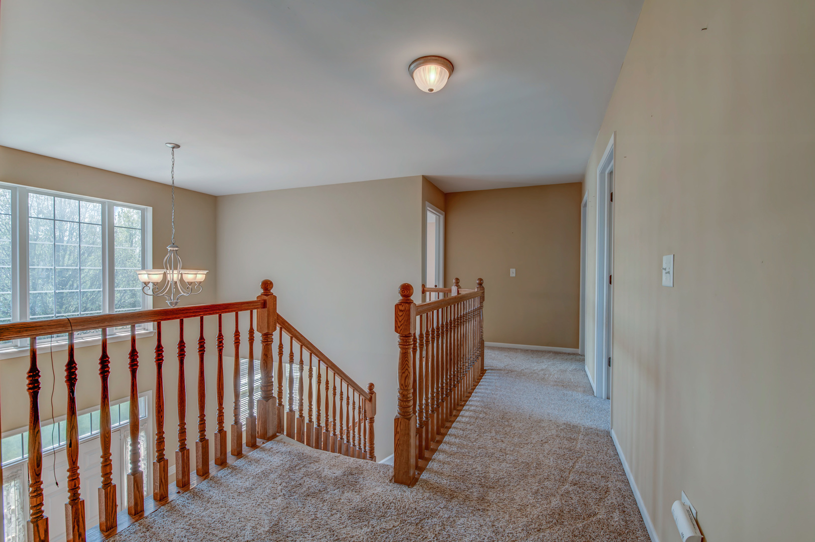 860 Spring Creek Circle Naperville, IL 60565 - Photo 18 of 26 a view of a hallway with entryway and stairs