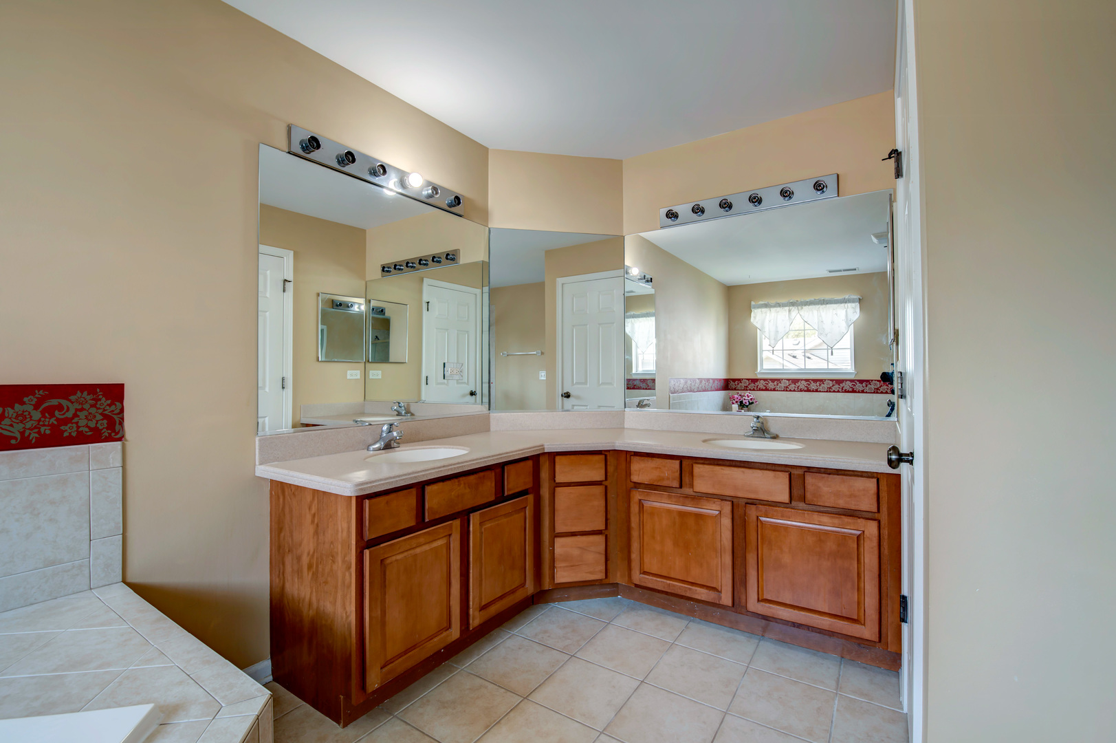860 Spring Creek Circle Naperville, IL 60565 - Photo 22 of 26 a kitchen with a sink and cabinets