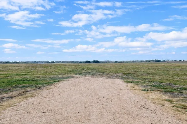 a view of an ocean beach and a city view