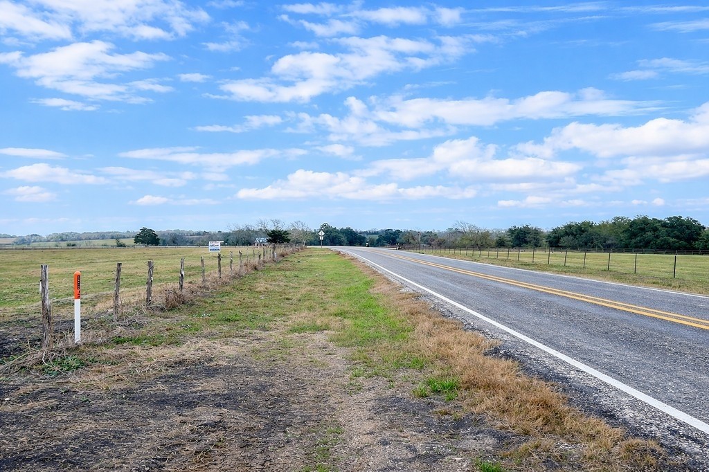 532 Rd Weimar Tx 78962 Road Weimar, TX 78962 - Photo 8 of 9 a view of a lake with a yard