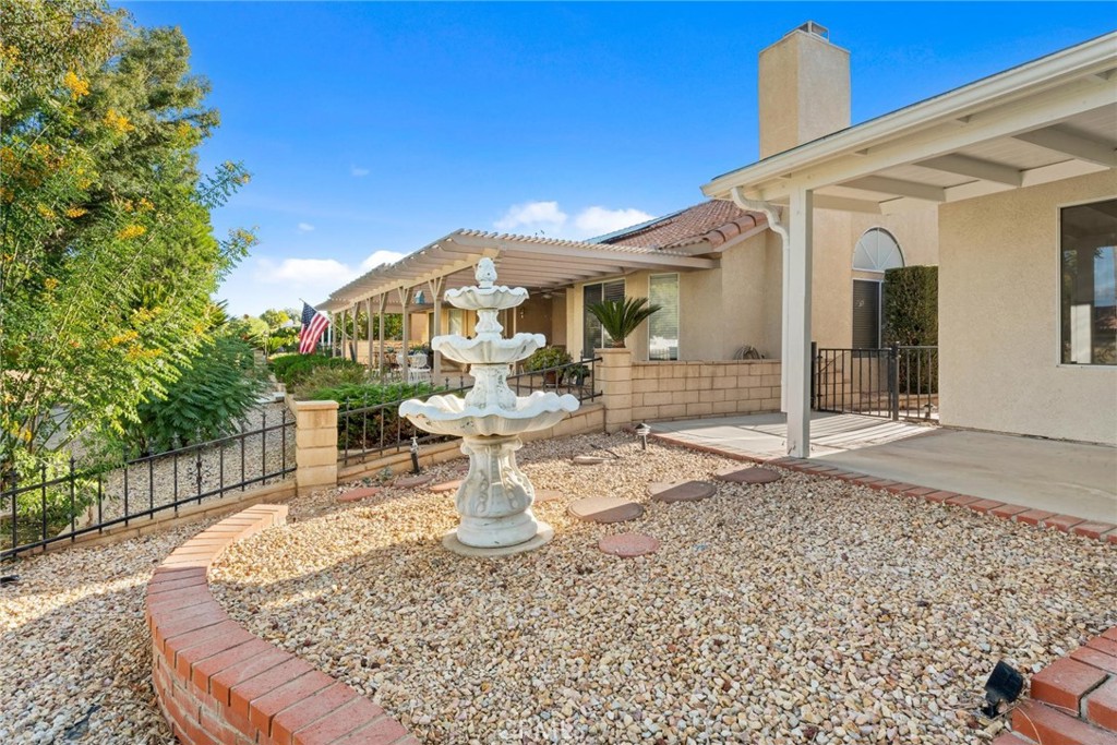 1886 Tamarack Lane Hemet, CA 92545 - Photo 31 of 40 a view of a house with a patio