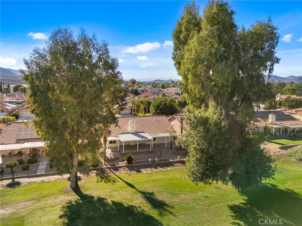 1886 Tamarack Lane Hemet, CA 92545 - Photo 37 of 40 a view of a house with swimming pool and yard