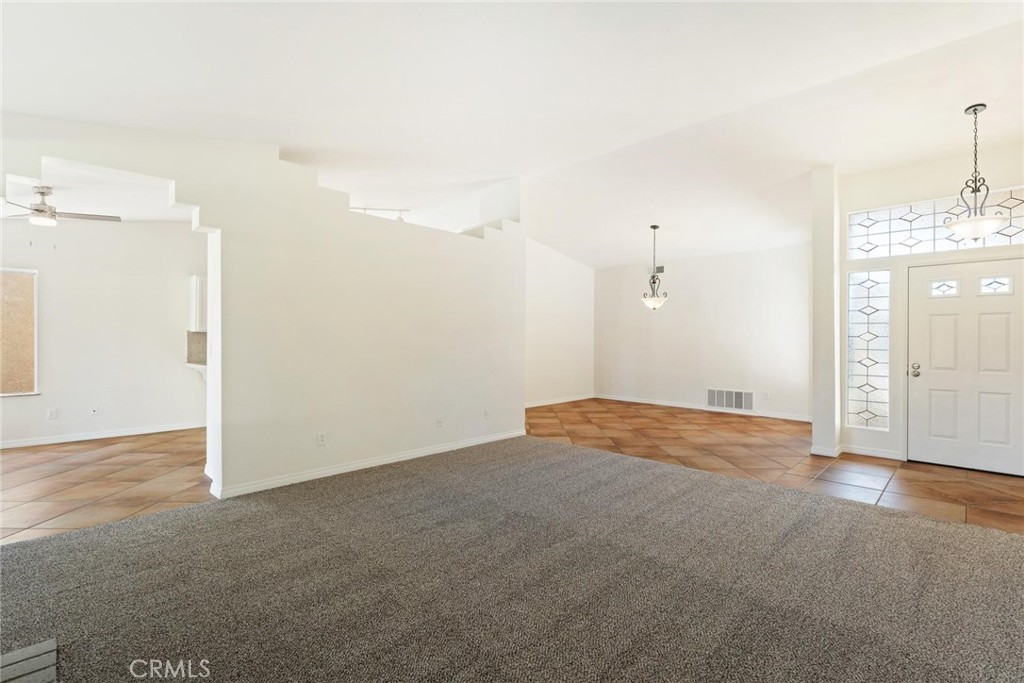 1886 Tamarack Lane Hemet, CA 92545 - Photo 8 of 40 a view of empty room with wooden floor and window
