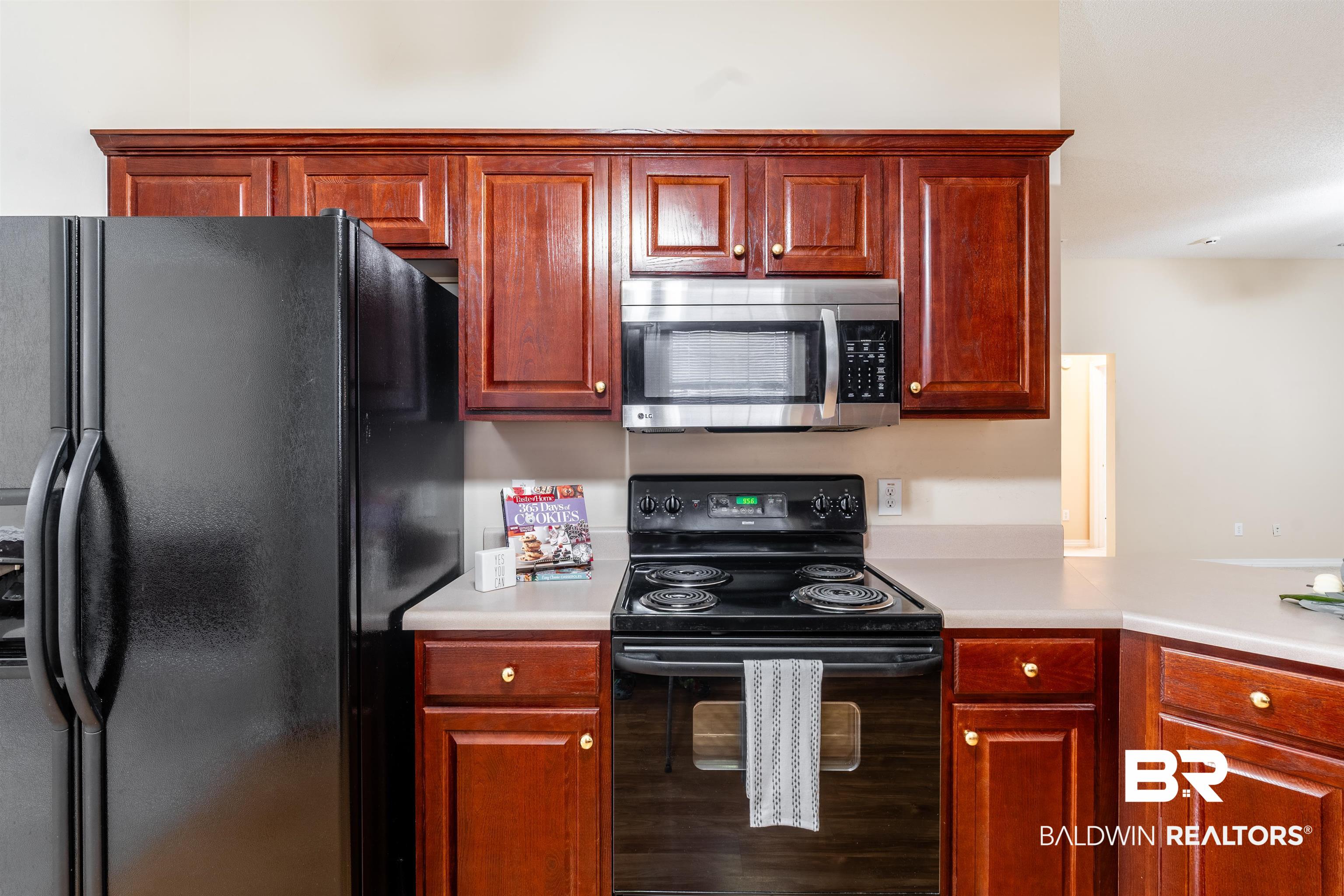 1784 Harrington Way Mobile, AL 36695 - Photo 7 of 18 Kitchen with black appliances