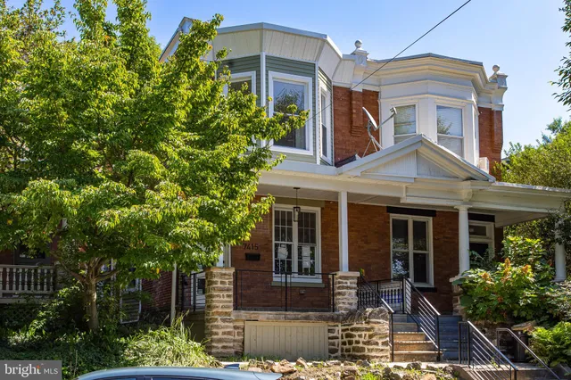 front view of house with a yard