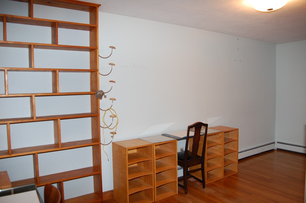 77 Old Post Road Walpole, MA 02032 - Photo 12 of 21 a view of a room with wooden floor and a window