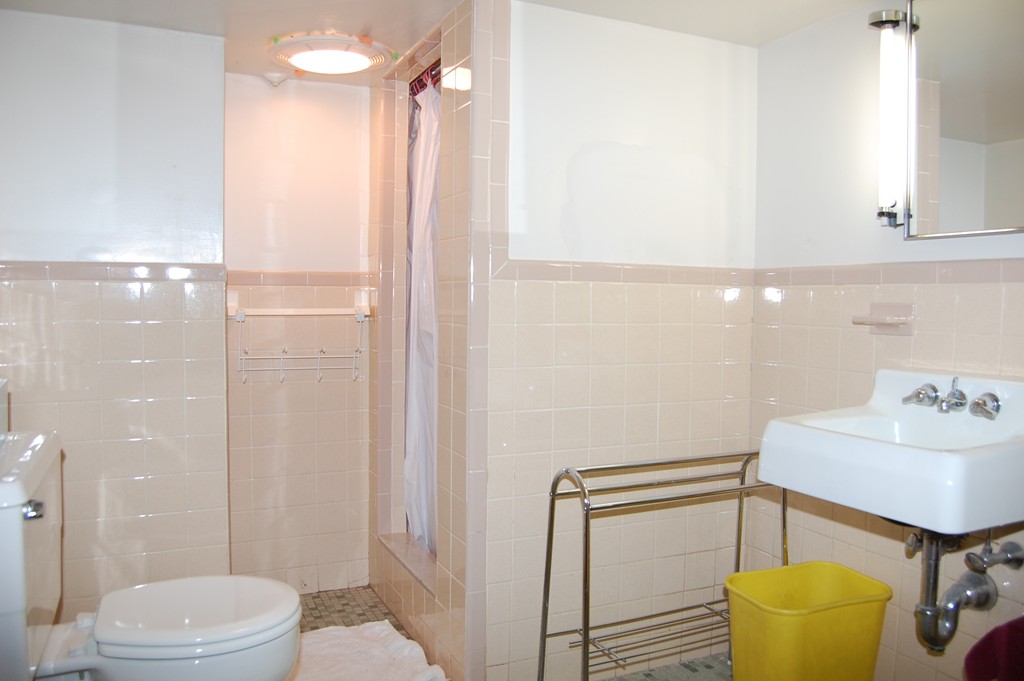 77 Old Post Road Walpole, MA 02032 - Photo 16 of 21 a bathroom with a sink a toilet and shower