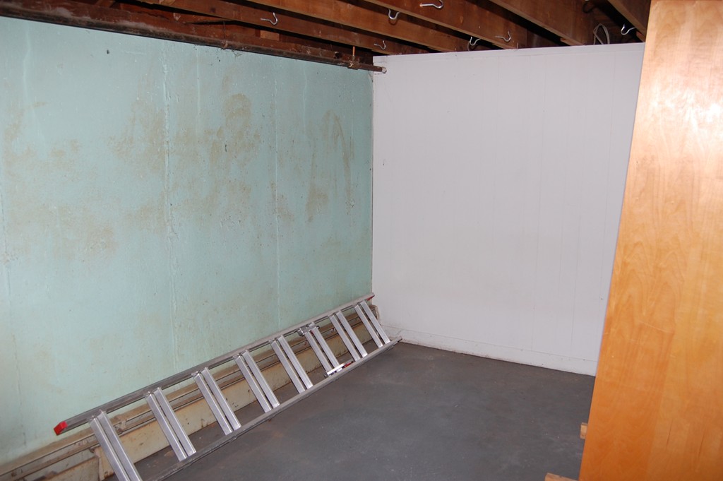 77 Old Post Road Walpole, MA 02032 - Photo 21 of 21 a view of a room with racks on the wall