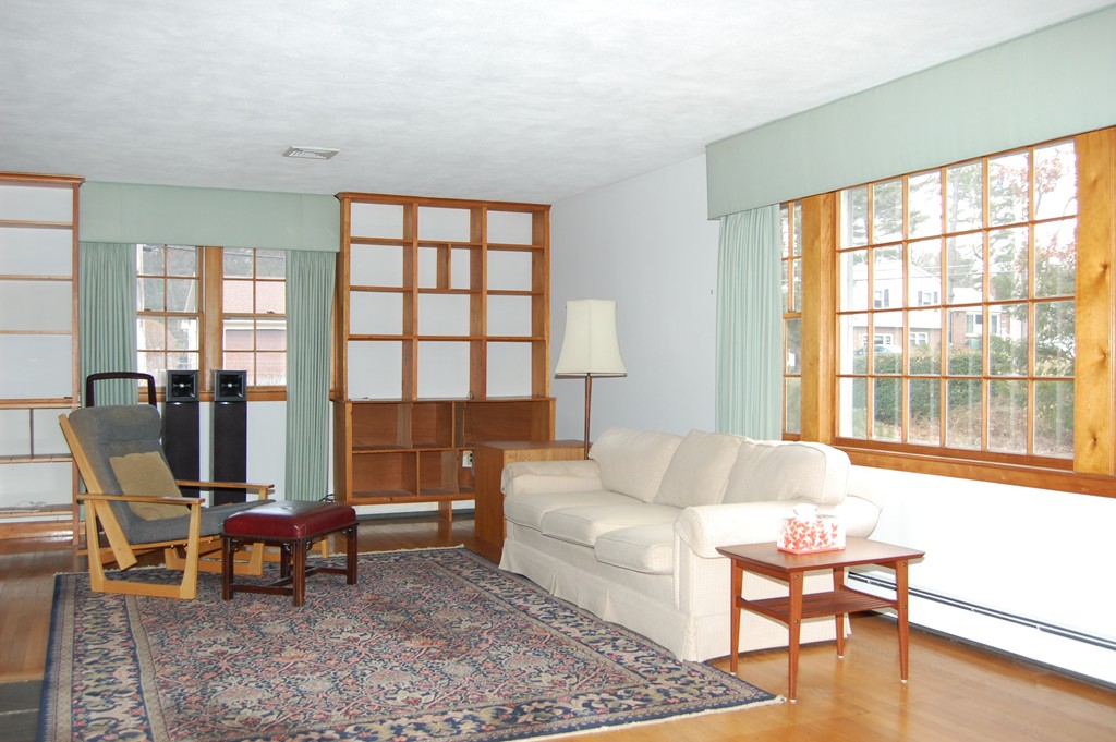 77 Old Post Road Walpole, MA 02032 - Photo 3 of 21 a living room with furniture and large windows