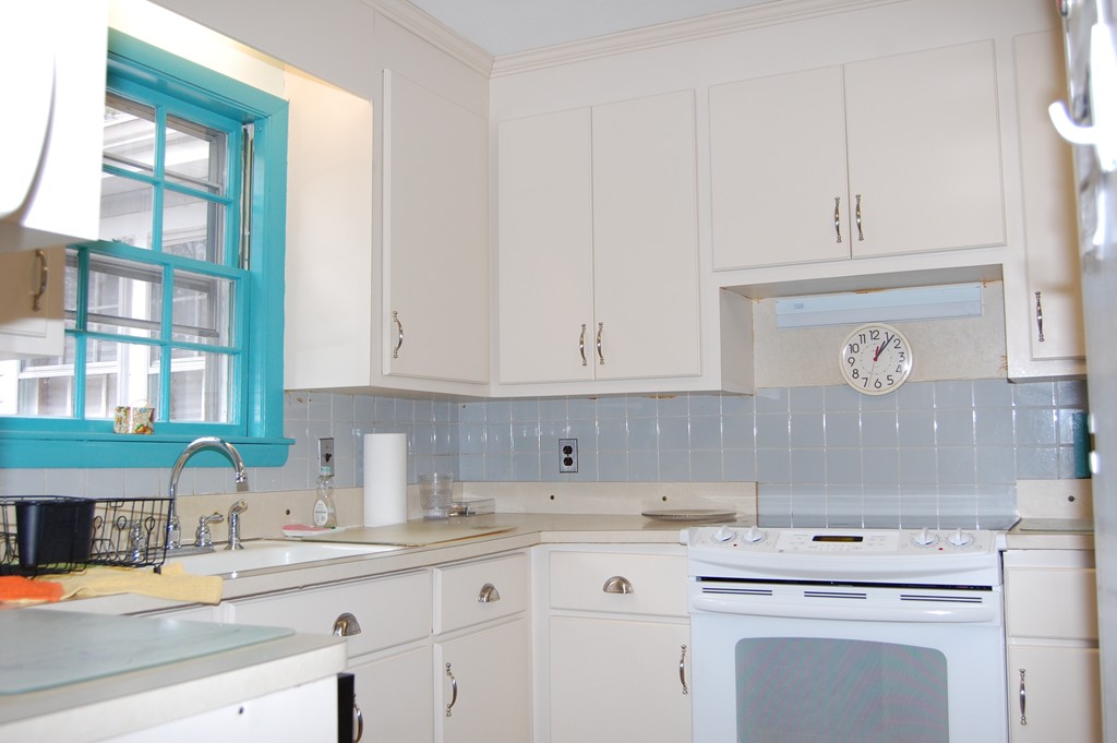 77 Old Post Road Walpole, MA 02032 - Photo 4 of 21 a kitchen with cabinets appliances a sink and a counter top space