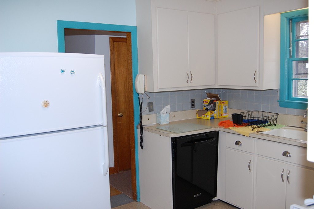 77 Old Post Road Walpole, MA 02032 - Photo 5 of 21 a utility room with cabinets washer and dryer