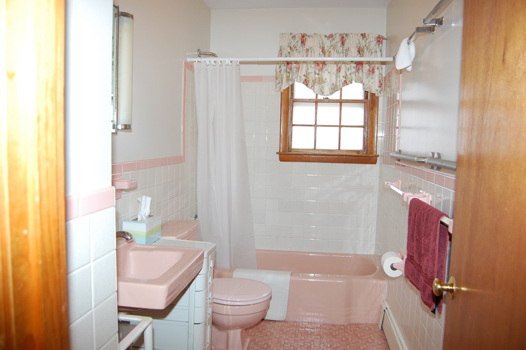 77 Old Post Road Walpole, MA 02032 - Photo 7 of 21 a bathroom with a granite countertop toilet a sink and a bathtub