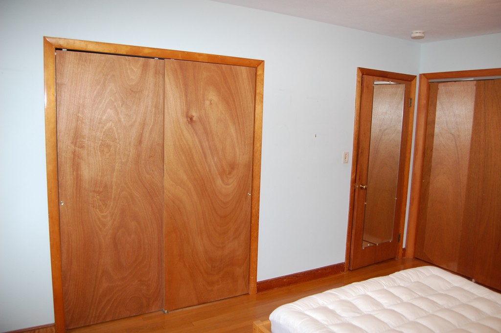 77 Old Post Road Walpole, MA 02032 - Photo 9 of 21 a bedroom with a bed and a shower curtain