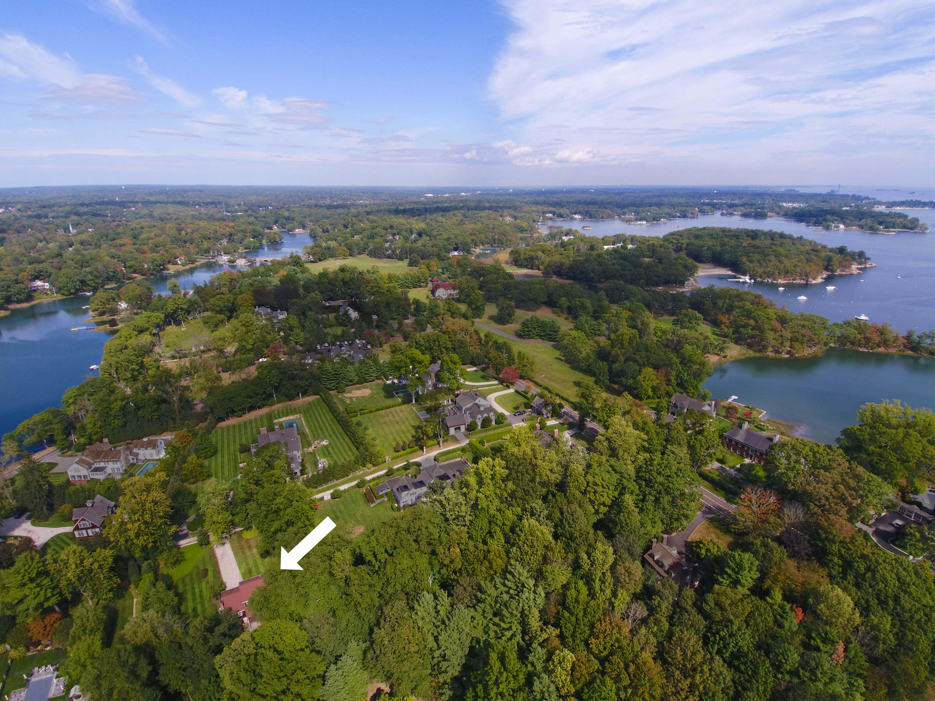 96 Long Neck Point Road Darien, CT 06820 - Photo 5 of 6 an aerial view of residential building with outdoor space and trees