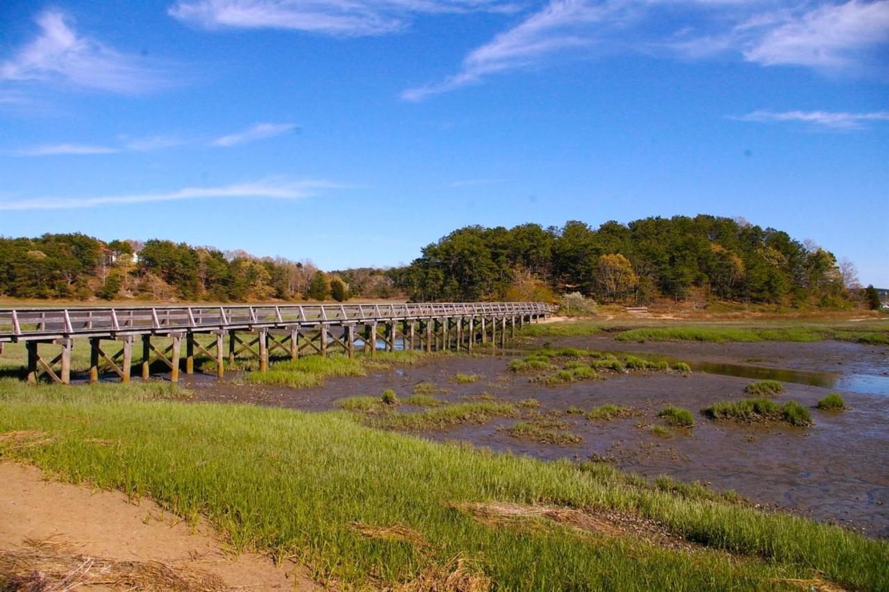125 Mill Hill Road Wellfleet, MA 02667 - Photo 22 of 22 a view of a city with mountains in the background