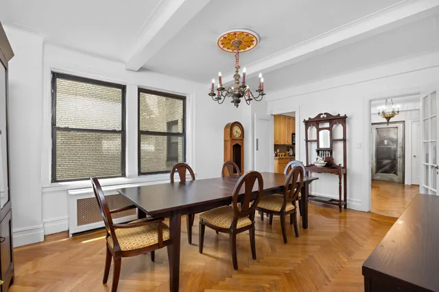 a kitchen with a stove a sink and a refrigerator