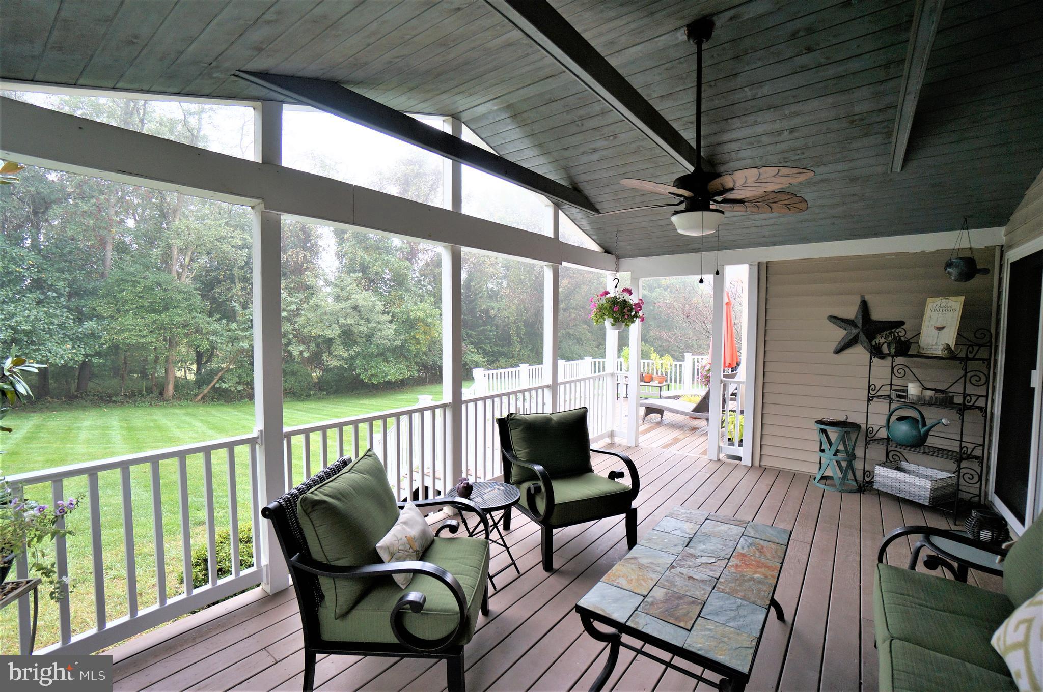 5096 Jericho Road Columbia, MD 21044 - Photo 17 of 37 Covered Porch Opens to Deck