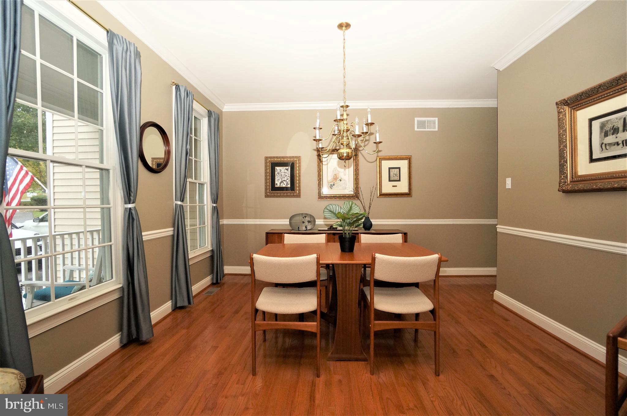 5096 Jericho Road Columbia, MD 21044 - Photo 6 of 37 Formal Dining Room Oak Flooring & Moldings