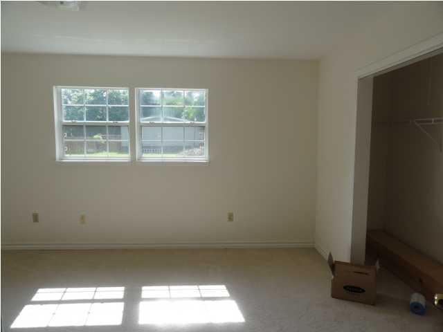 4291 Rebecca Road Crestview, FL 32539 - Photo 8 of 13 an empty room with a window