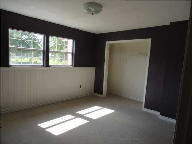 4291 Rebecca Road Crestview, FL 32539 - Photo 9 of 13 an empty room with a window