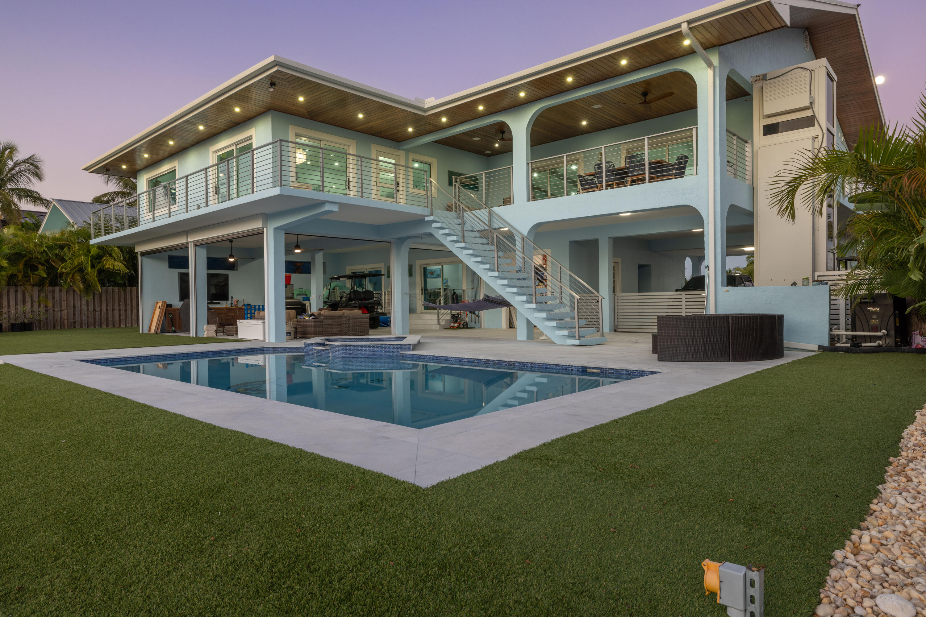 241 12th Street Key Colony Beach, FL 33051 - Photo 69 of 74 a view of a building with a swimming pool