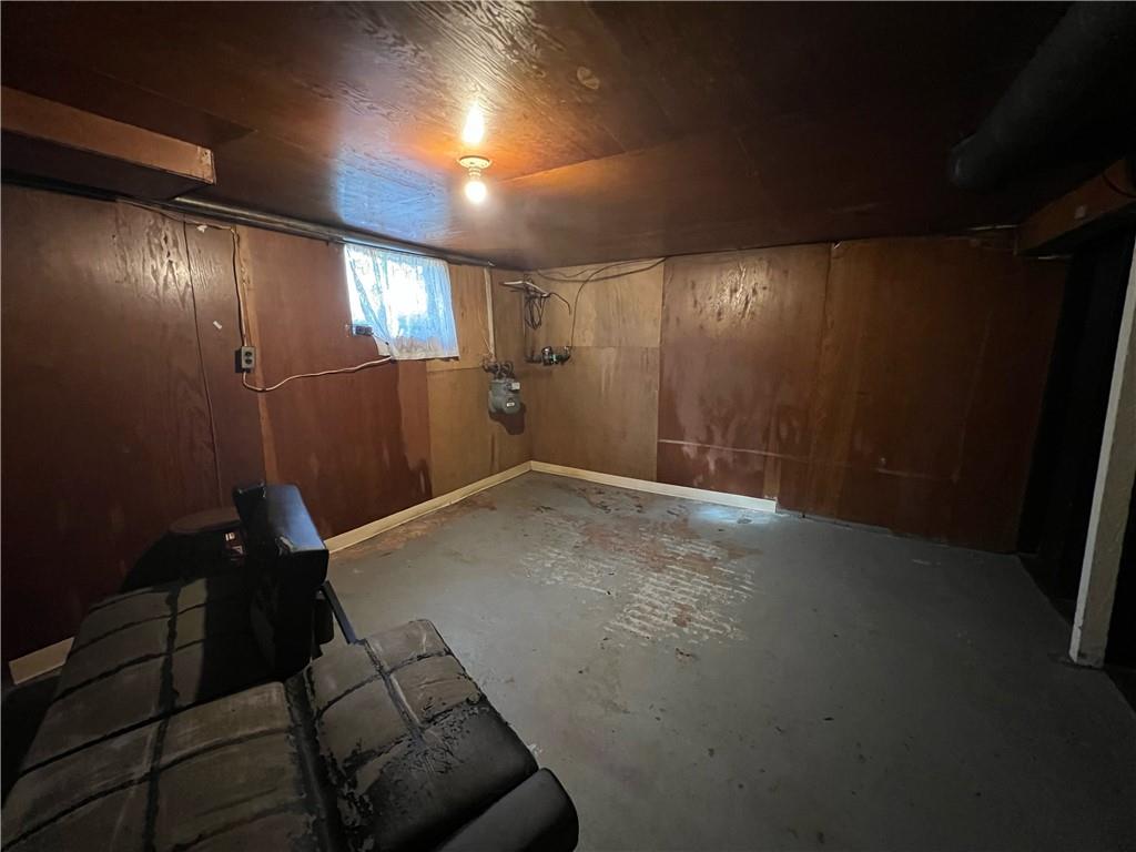 19 Fairview Street Uniontown, PA 15401 - Photo 18 of 19 an empty room with wooden floor and windows