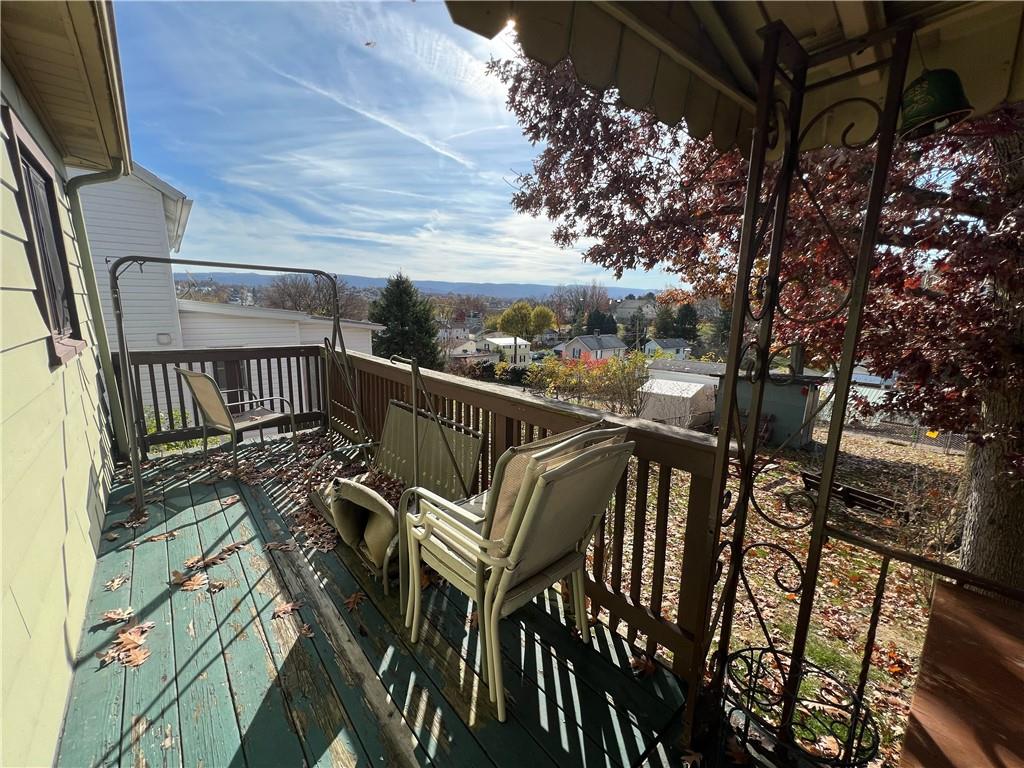 19 Fairview Street Uniontown, PA 15401 - Photo 2 of 19 a view of balcony with wooden floor and outdoor seating