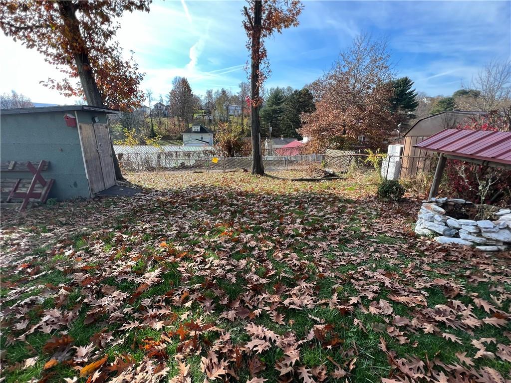 19 Fairview Street Uniontown, PA 15401 - Photo 5 of 19 a backyard of a house with lots of green space