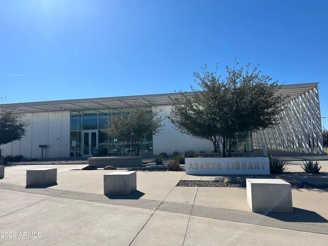 a view of a patio with couches and potted plants