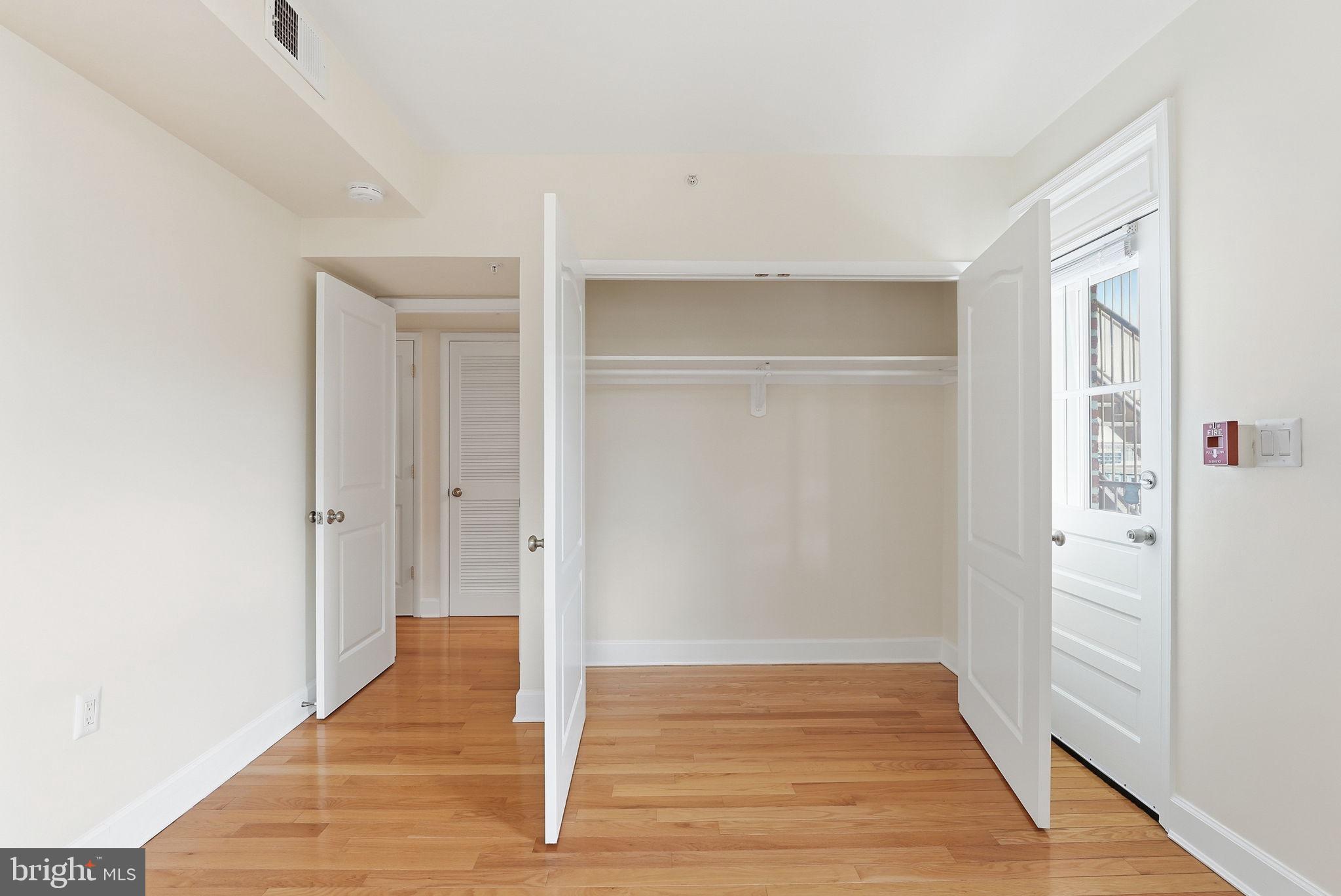 1858 California Street Northwest, Unit 33 Washington, DC 20009 - Photo 19 of 31 Sunny Bedroom, Ample Closet Space