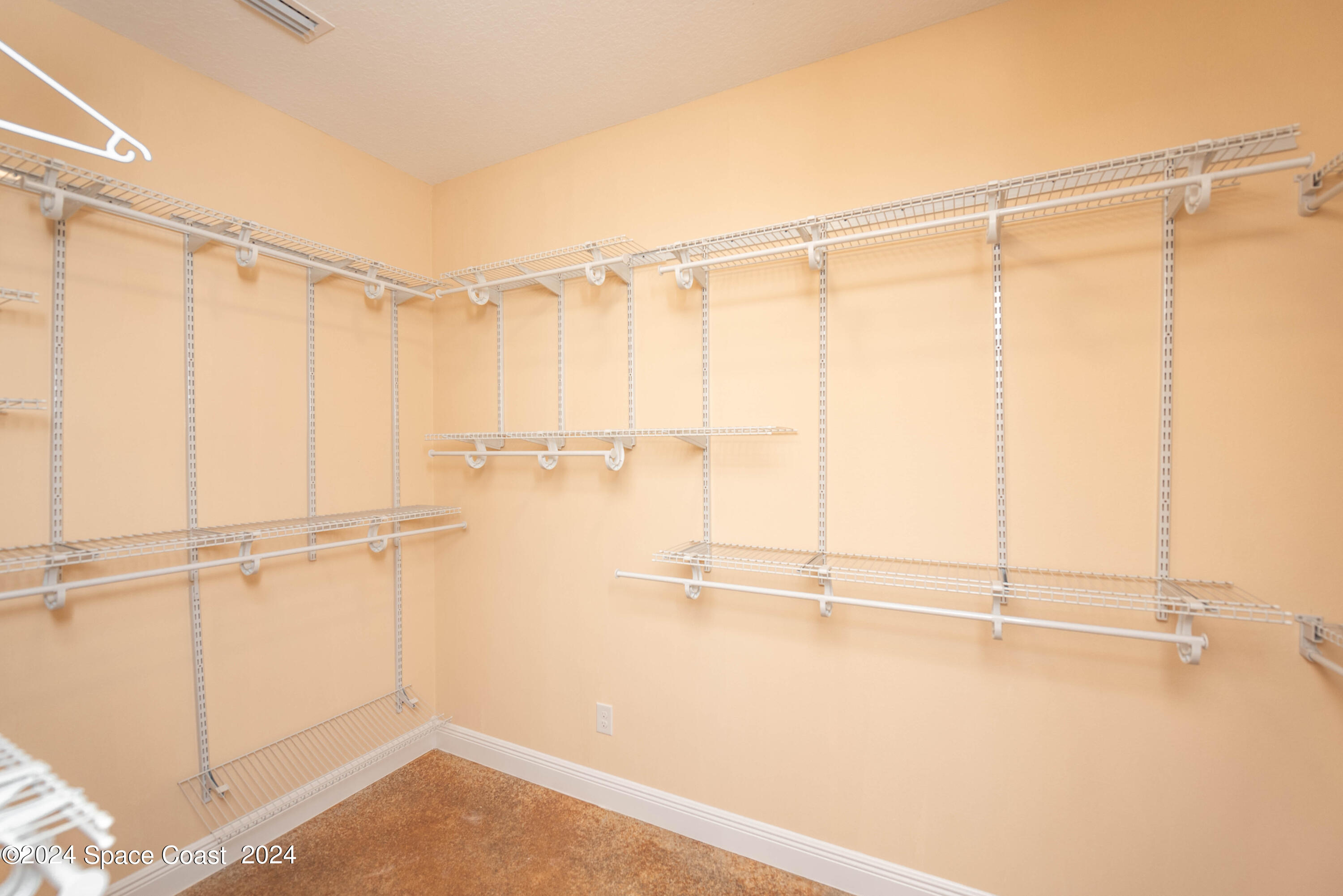 3750 Hield Road Melbourne, FL 32904 - Photo 32 of 63 a view of a room with racks on the wall