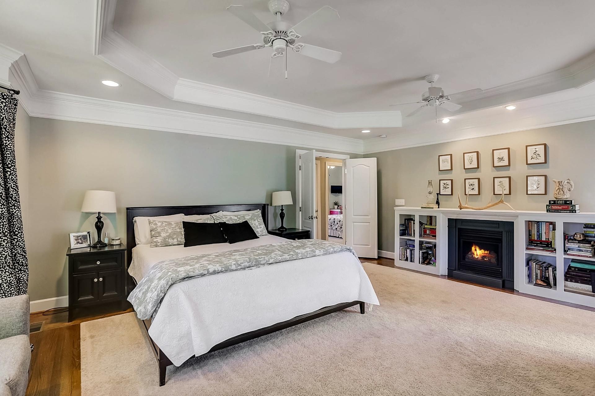 7532 King Road Fairview, TN 37062 - Photo 21 of 64 a bedroom with a bed and a fireplace