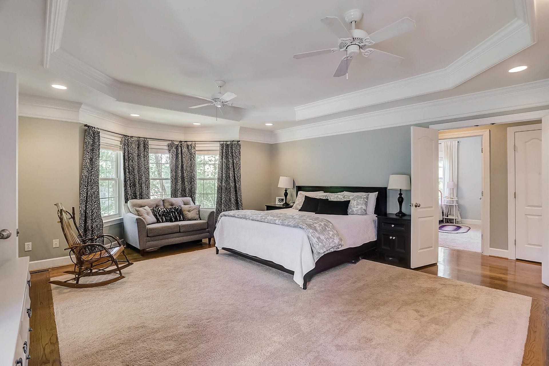 7532 King Road Fairview, TN 37062 - Photo 24 of 64 a spacious bedroom with a bed and large windows