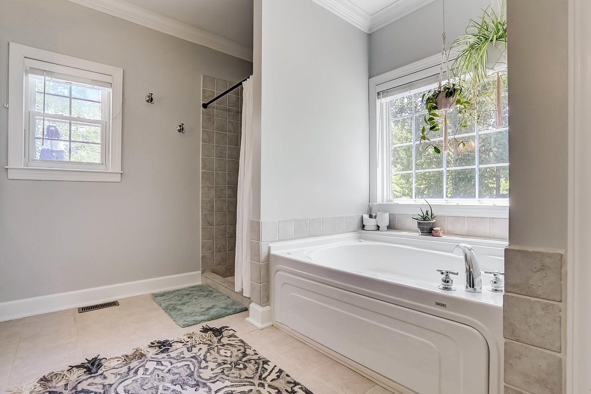 7532 King Road Fairview, TN 37062 - Photo 25 of 64 a bathroom with a bathtub and a window