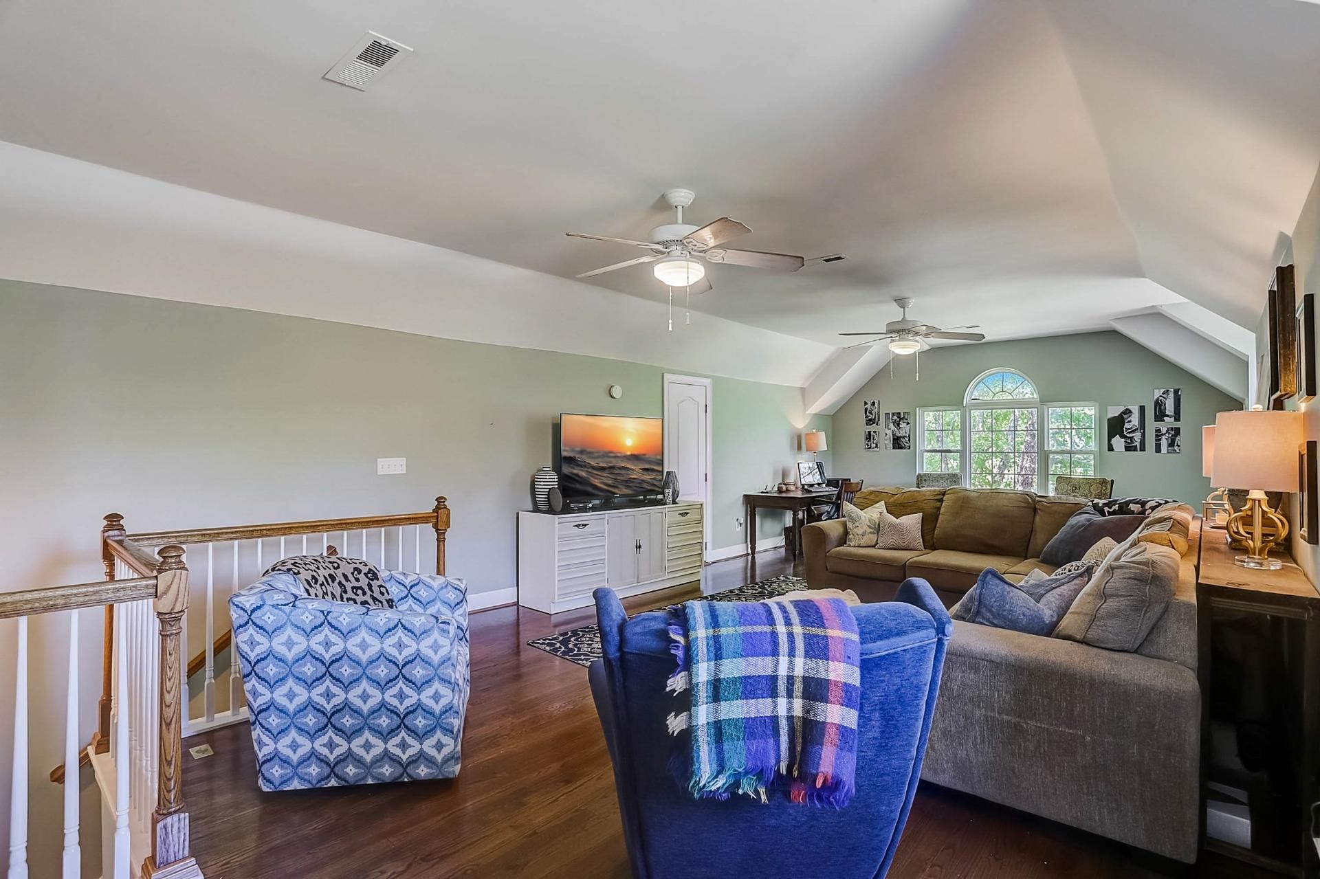 7532 King Road Fairview, TN 37062 - Photo 38 of 64 a living room with furniture a flat screen tv and a fireplace