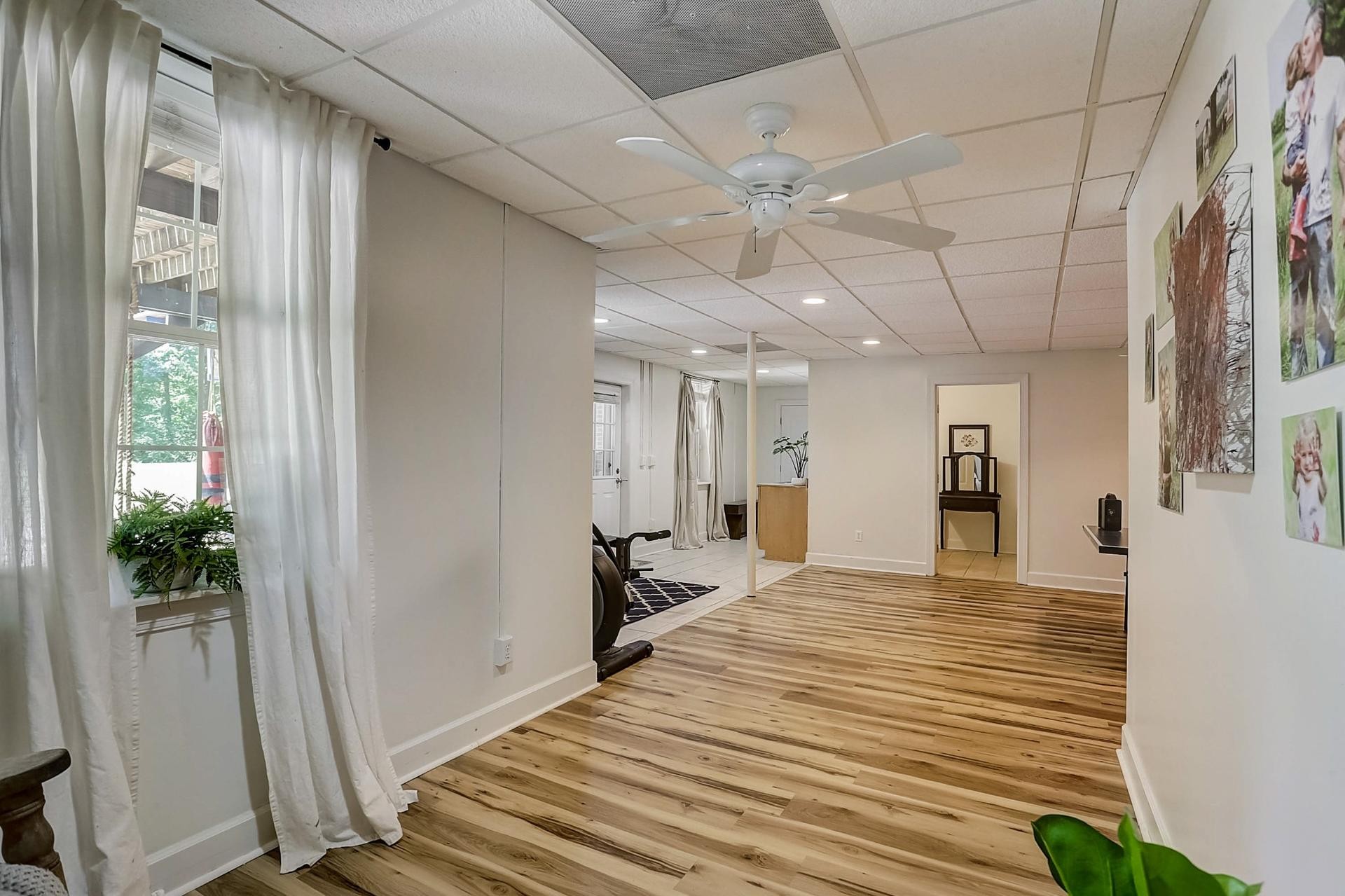 7532 King Road Fairview, TN 37062 - Photo 45 of 64 a large room with wooden floor and windows