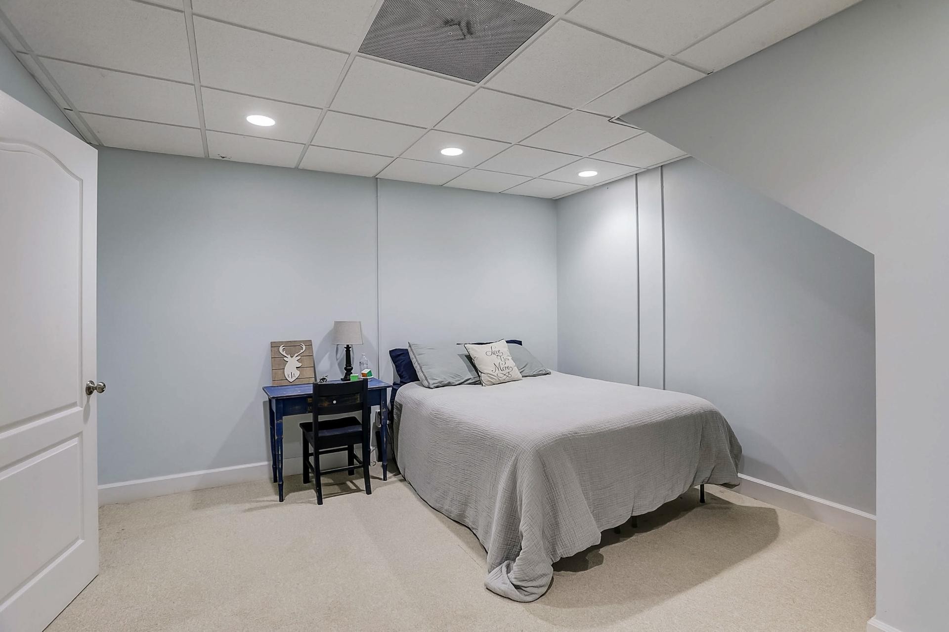 7532 King Road Fairview, TN 37062 - Photo 49 of 64 a bedroom with a bed and a table