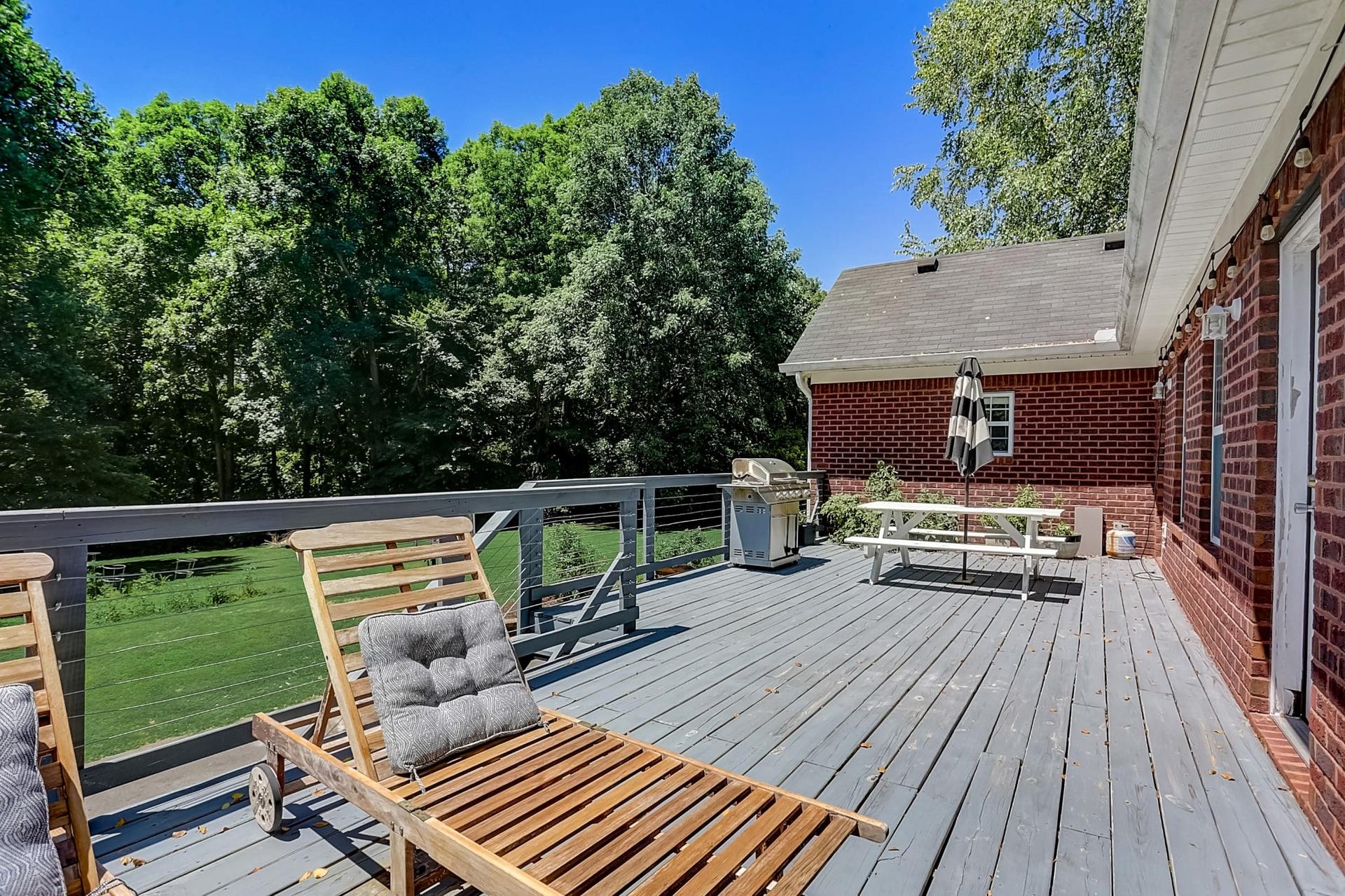 7532 King Road Fairview, TN 37062 - Photo 53 of 64 a view of house with deck and outdoor seating